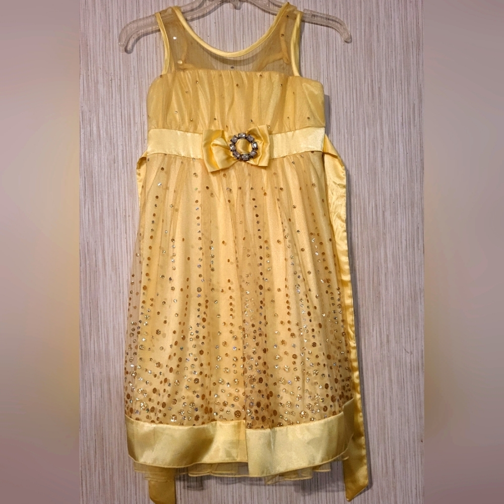 Beautiful girls formal spring dress. Yellow with sequins and sheer accents.